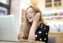 How to Start Freelancing in Pakistan Step by Step a happy woman starting her freelancing in pakistan using laptop happily.